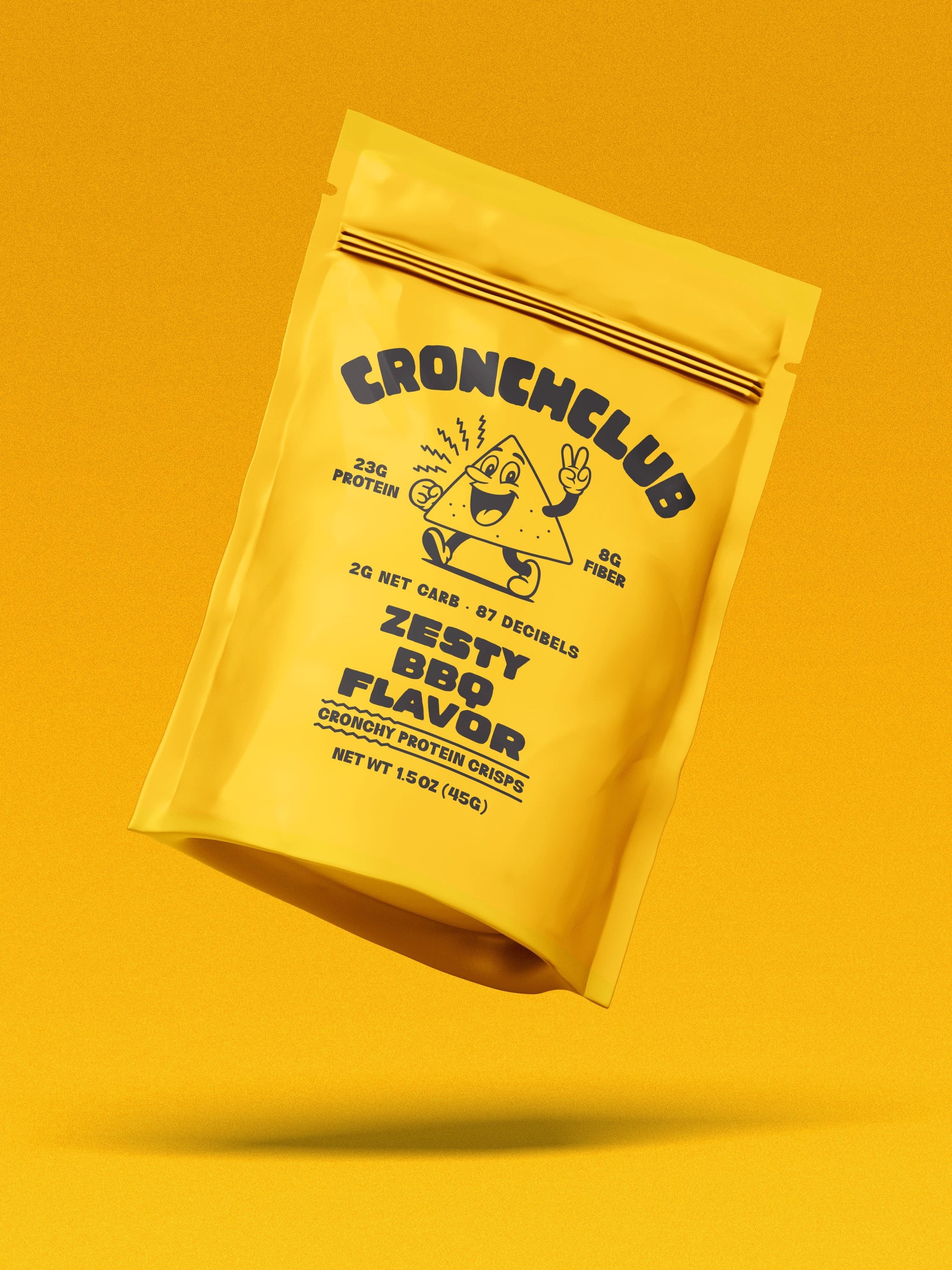 Floating yellow Cronchclub bag against a matching yellow background. Zesty BBQ Flavor. The mascot Cronchy is shown next to text reading '23g Protein' and '87 Decibels'
